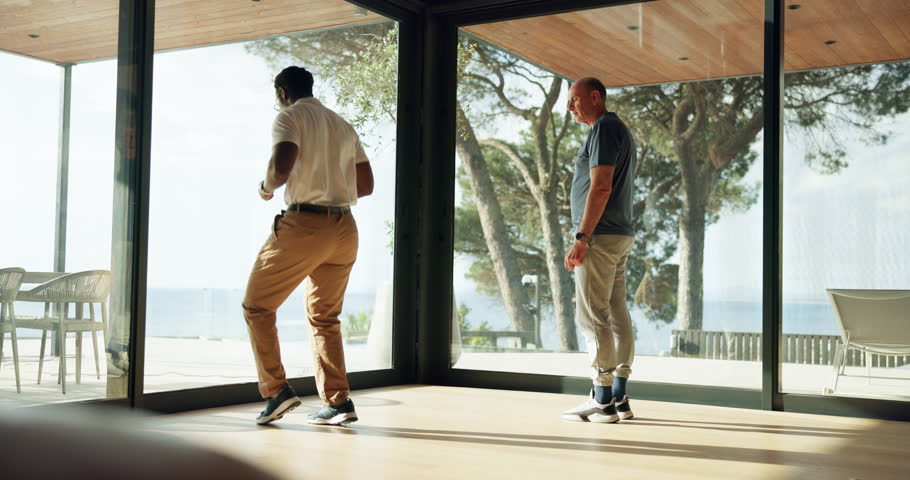 Personal trainer, elderly man and fitness in house with run for physical therapy, training and wellness. Active, senior person or coach in home visit with cardio workout, physio exercise and support.