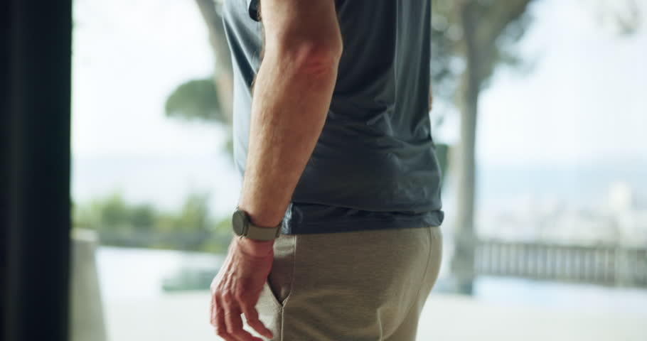 Hands, senior man and back injury in fitness with muscle tension, workout accident and inflammation. Wellness, old person or spine fracture in home from herniated disc, joint ache or training mistake