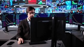 Man At Stock Exchange Monitoring Multiple Stock Market Screens Online - Powered by Shutterstock - Get 15% off with code: PIKWIZARD15