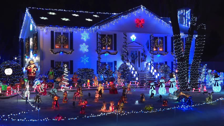 Vibrant Christmas house glowing with festive holiday lights