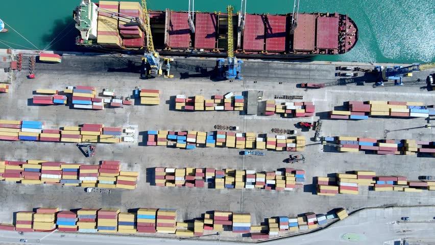 Cargo ship loading containers in the port of Durres.
