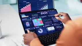 African American Data Analyst Using Data Analytics KPI Dashboard - Powered by Shutterstock - Get 15% off with code: PIKWIZARD15