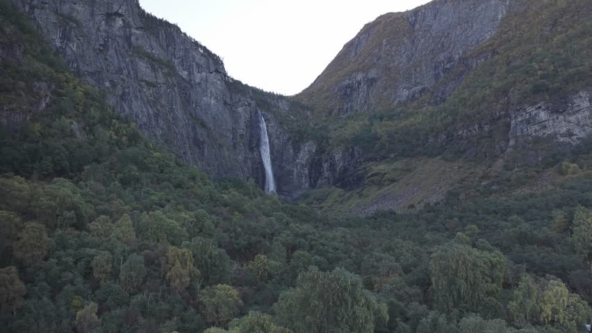 Feigefossen waterfall in autumn. Western Norway, drone footage