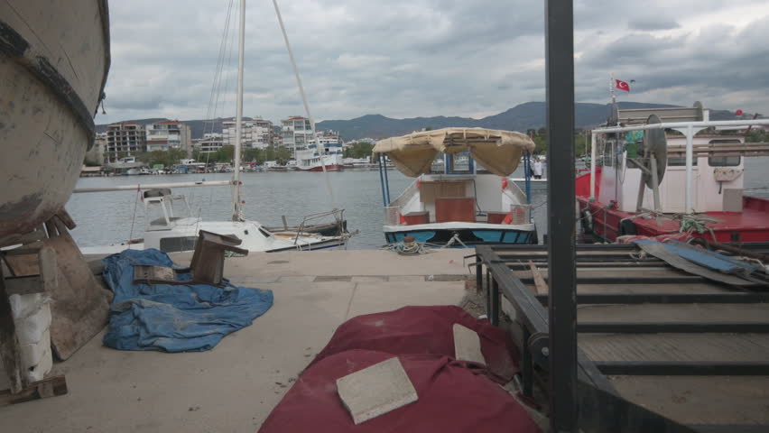 View of the Port from Between the Boats in the Fishing Port
