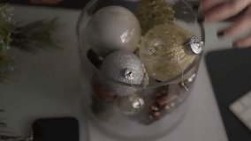 Gathering glittering baubles and pinecones for festive cheer. - Powered by Shutterstock - Get 15% off with code: PIKWIZARD15