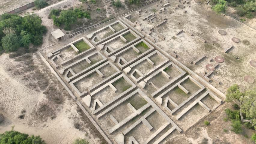 Drone footage of Mound F Workshops and Workers Quarters - Indus Valley Civilization. Harappa, Punjab, Pakistan - 04 OCT 2025