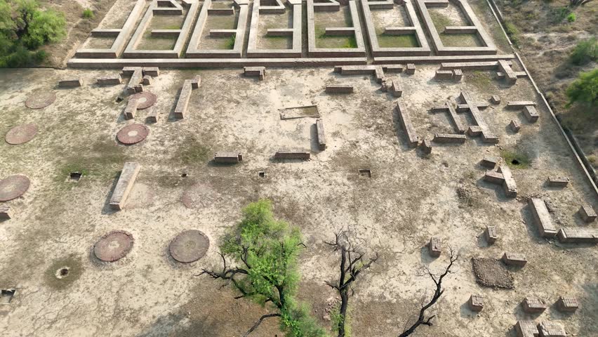 Drone footage of Mound F Workshops and Workers Quarters - Indus Valley Civilization. Harappa, Punjab, Pakistan - 04 OCT 2025