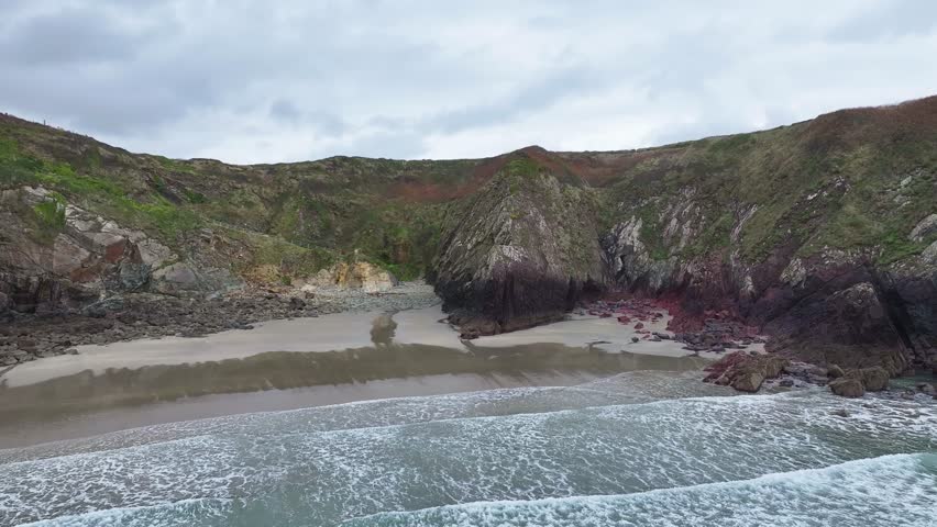 Pembrokeshire National Park in west Wales, September 2025, beach on a cloudy day near Stumble head lighthouse