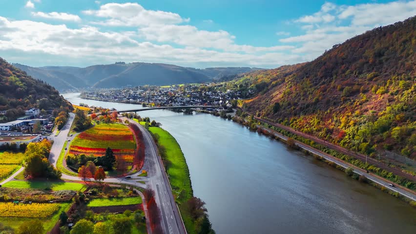 Aerial drone view of wine region of the Mosel Valley in autumn. Wine tourism Turant Castle, Rhineland-Palatinate, Germany . High quality 4k footage