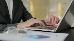 Hands typing text on a laptop in the office - Powered by Shutterstock - Get 15% off with code: PIKWIZARD15