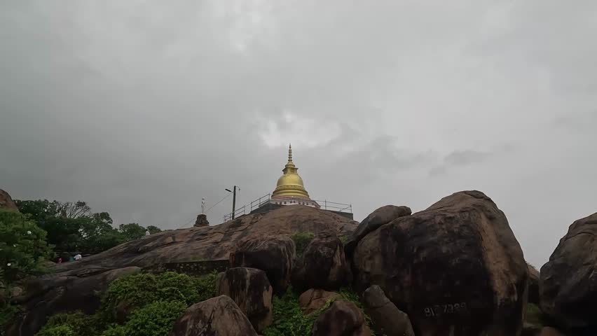 Golden Stupa at Kirinda Temple, Sri Lanka – Majestic Buddhist Monument and Sacred Site