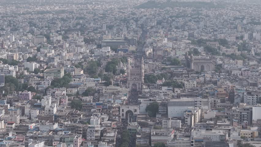 Drone footage of Charminar in Hyderabad — capturing the iconic monument, surrounding bazaars, and the lively atmosphere of the historic Old City.