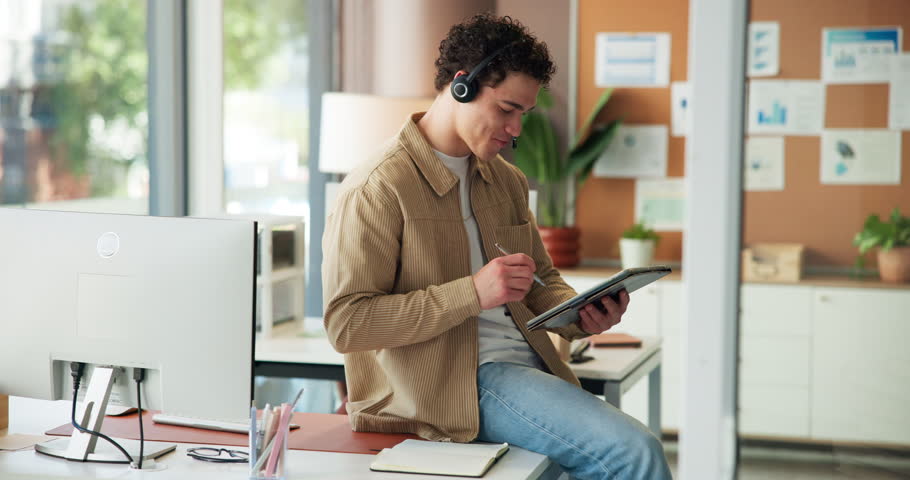 Creative, man and headphones with tablet in office for editing sketch, web design and graphic designer. Male person, stylus and digital art for campaign layout, research and brand logo for project