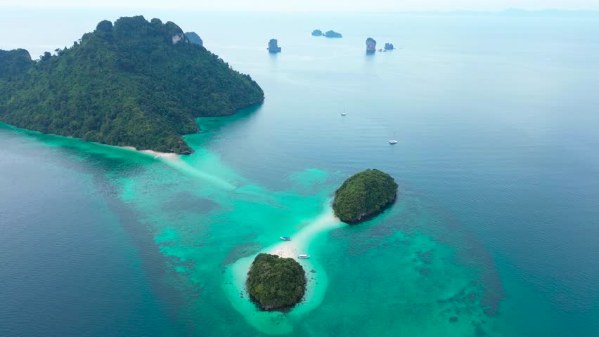 The beautiful islands of Krabi Province in southern Thailand. The Thale Waek Islands with their sandy isthmuses, a drone view of the popular tourist islands in southern Thailand.