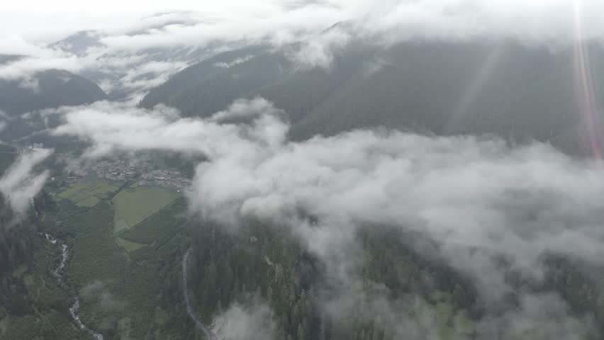 Western Sichuan in 4K Aerial Views of Mountains, Lakes and Clouds