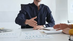 Business people partners engaging in a handshake following a successful meeting, solidifying a business deal or contract in a sleek, modern office environment. Handshake concept - Powered by Shutterstock - Get 15% off with code: PIKWIZARD15