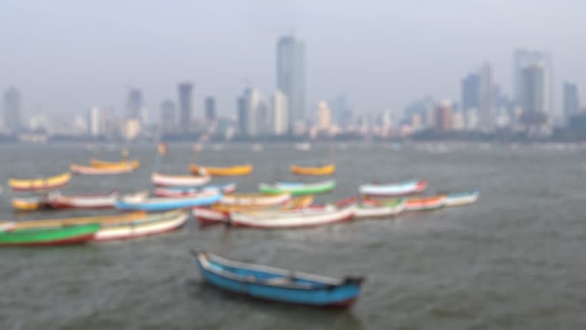 Bokeh view of boats near Koliwada district, Worli, Mumbai, India. Blurred background footage.