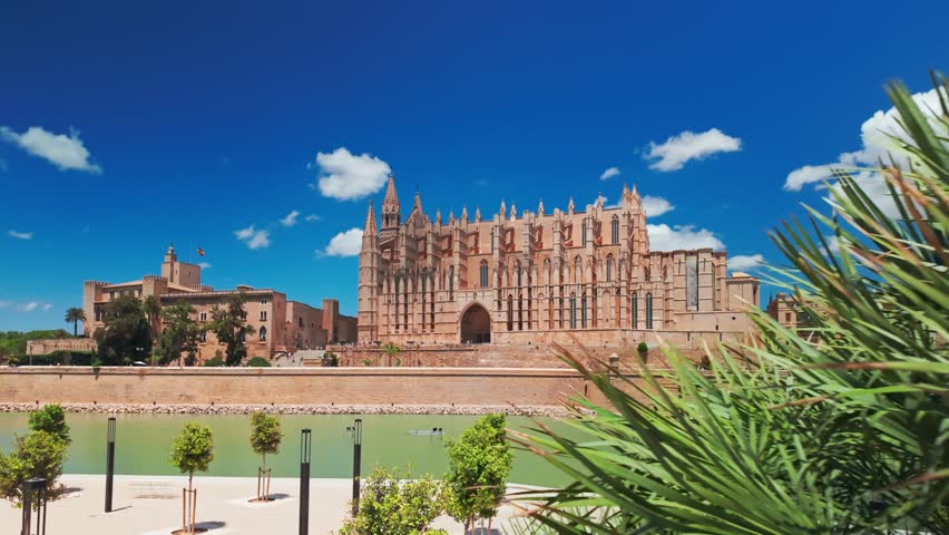 The Cathedral of Santa Maria of Palm, Palma de Mallorca, Mallorca, Balearic Islands, Spain. Steadicam revealing footage of the historic Cathedral building on Majorca island at sunny day. 