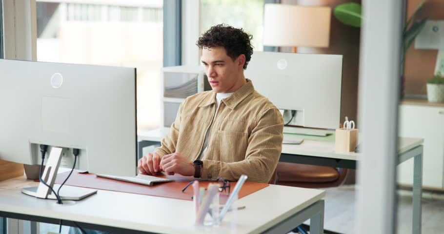 Computer, man and tired with yawn at creative agency for burnout, stretching or overworked on story. Internship, journalist and tech with glasses in office for article fatigue, low energy and editing