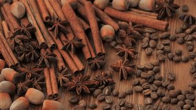Warm Autumn and Winter Aromatic Spices with Cinnamon, Star Anise and Coffee Beans on Wooden Table for Cozy Kitchen and Holiday Mood - Powered by Shutterstock - Get 15% off with code: PIKWIZARD15