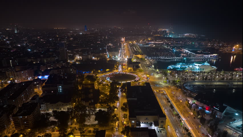 night illumination barcelona city center traffic bay aerial panorama 4k timelapse spain
