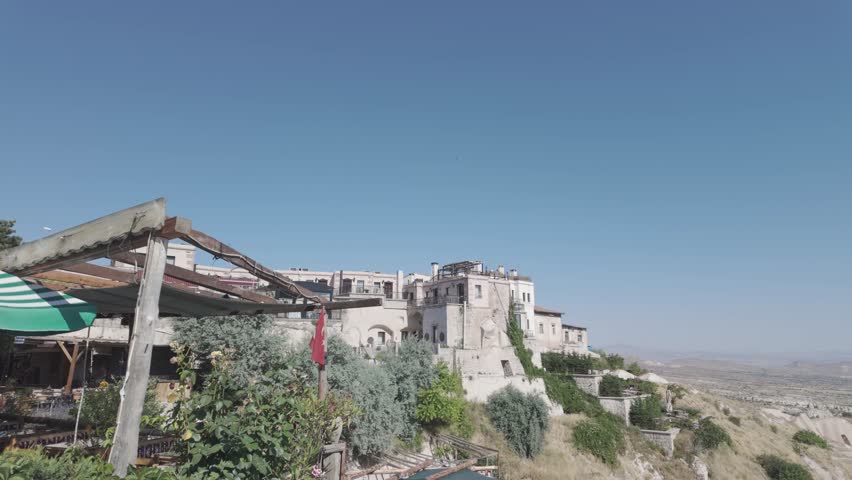 Buildings Carved into the Rock on a Cliff Edge in a Cappadocian Village