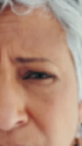 Optometry, glasses and face of mature woman with blur for frame, prescription lens and sight. Healthcare, ophthalmology and portrait of happy person with spectacles, vision improvement and eye care