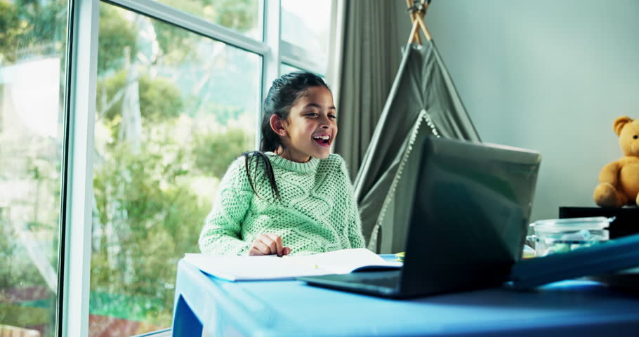 Girl, excited and video call with laptop in home for online tutoring, education and knowledge. Kid, elearning and smile for study, achievement and celebration with virtual class for child development