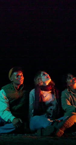 Night, friends and camping with outdoor surprise, check constellations or star gazing for bonding. Meteor shower, wow or people watch dark sky together for connection, celestial event or mockup space