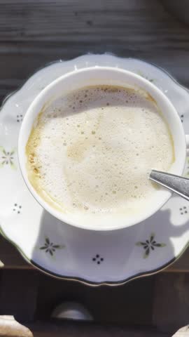cup of cappuccino on a plate
