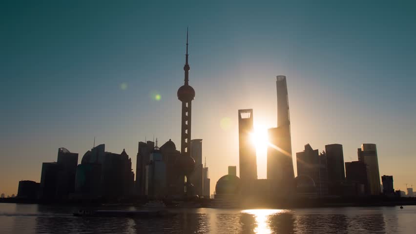 Shanghai China City Skyline at Sunrise with Iconic Tower and River View