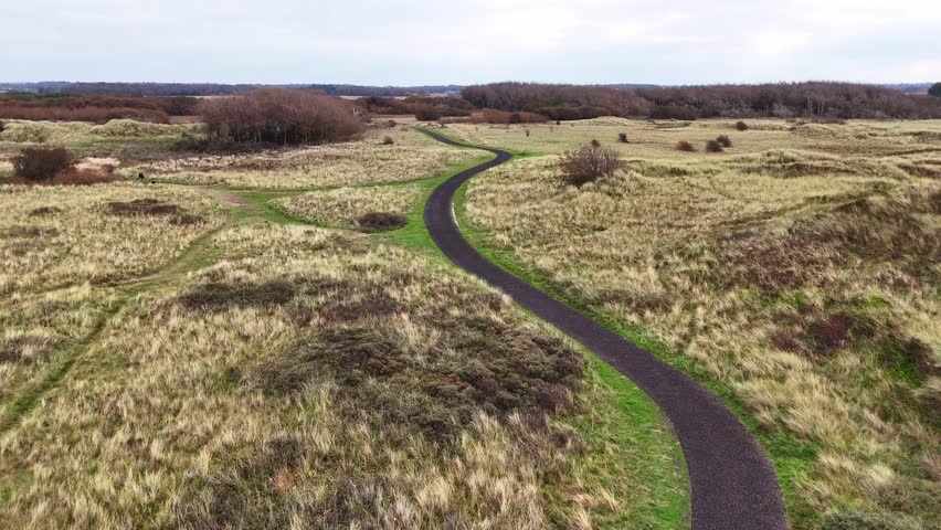 Overlooking the Crosby Coastal Path veering through the meadows and dunes between Crosby and Hightown.