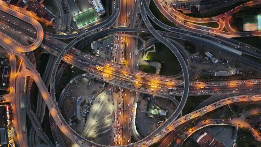 Istanbul Unalan junction Drone shot. Aerial Establishing Shot of Huge Freeway Intersection at Dusk in Istanbul, Birds Eye View Overhead Drone Shot.