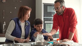 Family baking Christmas cookies together in the kitchen - Powered by Shutterstock - Get 15% off with code: PIKWIZARD15
