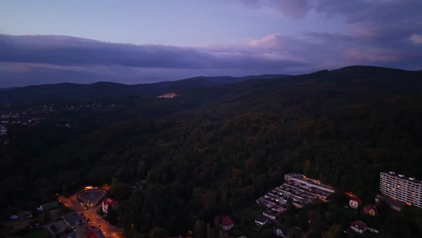 Stunning and Scenic Aerial View of Lush Forested Hills Captured Beautifully at Dusk 