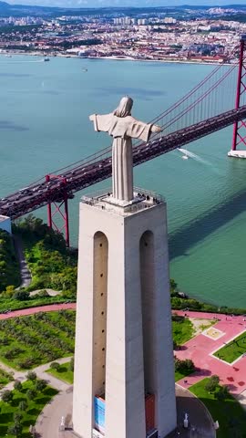 King Christ At Almada In District Of Lisbon Portugal. Christ The King Sanctuary. Tourism Landmark. King Christ At Almada In Portugal. 25Th April Bridge Scenery. Postcard Landscape. Lisbon Skyline.