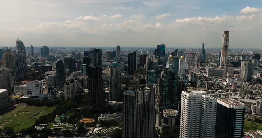 Dynamic skyline of Bangkok showcasing urban growth and modern skyscrapers. Bangkok, Thailand.