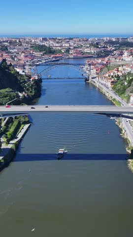 Porto Skyline At Porto In District Of Porto Portugal. Coastal City. Luis I Bridge Landscape. Boat Sailing. Porto Skyline In Portugal. Portugal Skyline. Travel Landscape.