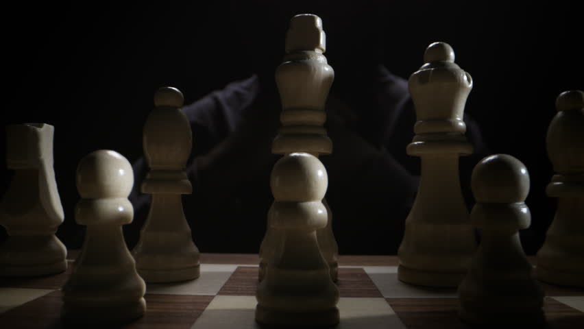 Minimalist Concept of a Chess Duel Making First Move on Dark Background Showing Tactical Foresight, Patience, Mental Concentration, Analytical Thinking, and Symbolic Representation of Planning and