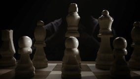 Minimalist Concept of a Chess Duel Making First Move on Dark Background Showing Tactical Foresight, Patience, Mental Concentration, Analytical Thinking, and Symbolic Representation of Planning and - Powered by Shutterstock - Get 15% off with code: PIKWIZARD15