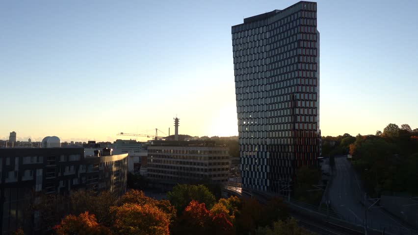 Stockholm, Sweden A sunrise view in autumn of the landmark STHLM 01 tower in the Hammarbybacken district.