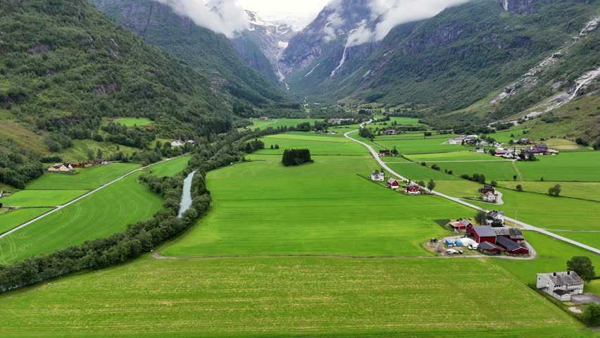 An Aerial view of a peaceful rural landscape in the lush Oldedalen valley, near the cruise destination Olden, Norway