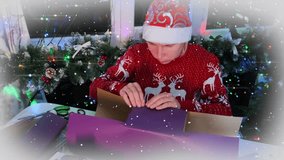 Woman in red holiday sweater and Santa hat wrapping present in purple paper at decorated table. Christmas tree, garland and cozy lights create festive winter atmosphere. - Powered by Shutterstock - Get 15% off with code: PIKWIZARD15