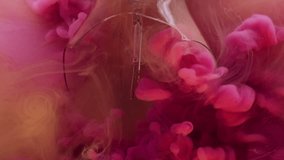 Broken lamp. Color smoke cloud. Defocused pink yellow paint fluid cracked glass swirling water spreading on abstract art background. - Powered by Shutterstock - Get 15% off with code: PIKWIZARD15