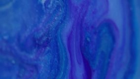 Vertical video. Splash blue texture. Paint background. Blur bright color water sparkling droplet floating on flowing acrylic abstraction. - Powered by Shutterstock - Get 15% off with code: PIKWIZARD15