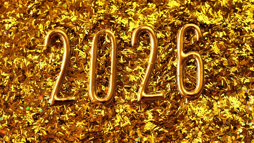 Shimmering glittering 2026. New Year and Christmas symbol golden wallpaper.number two thousand twenty six.Shining glitter gold festive background. 4k footage