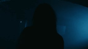 Scary dead Creature Ghost walking threw corridors Helloween style with light setup in 4K - Powered by Shutterstock - Get 15% off with code: PIKWIZARD15