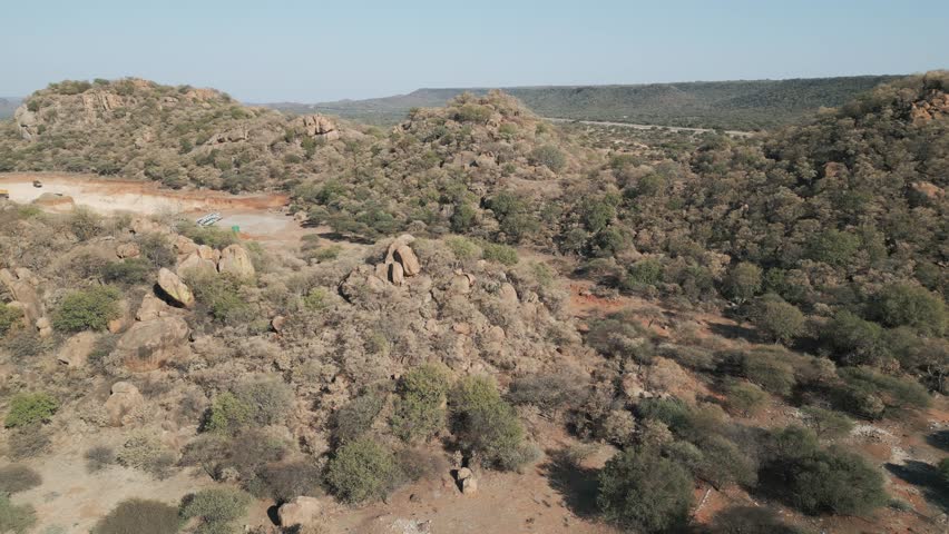 aerial view, African landscape typical Southern African region ,mountain range, savannah bush with acacia trees, shrubs and sand