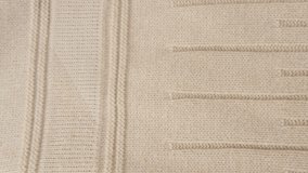 close-up relief satisfying knitted woolen texture, female Hand touching woolen fabric surface testing, quality assurance, meets brand's unwavering standards, craftsmanship reputation - Powered by Shutterstock - Get 15% off with code: PIKWIZARD15