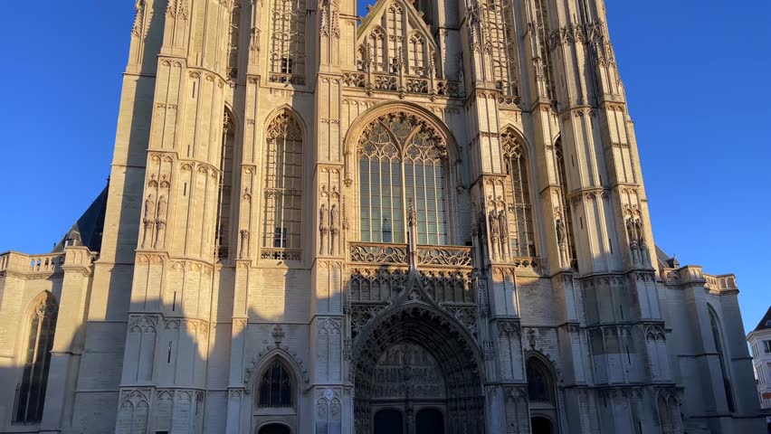 Cathedral of Our Lady, Antwerp, Belgium, looking up at the historic gothic architecture and intricate detailing of the facade